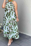 Botanical A-line midi dress, sleeveless halter neck, green leaf print on white