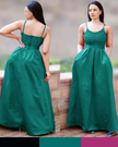 Teal maxi dress with thin straps, patterned corset bodice, and gathered full skirt