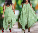 Green sleeveless V-neck dress with white print, loose fit and asym hem