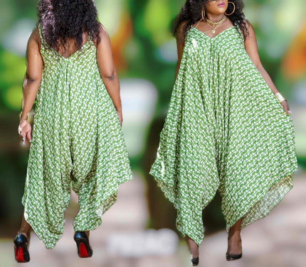 Green sleeveless V-neck dress with white print, loose fit and asym hem
