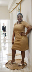 Nude polo dress with gold embroidery, short sleeves and collared neckline