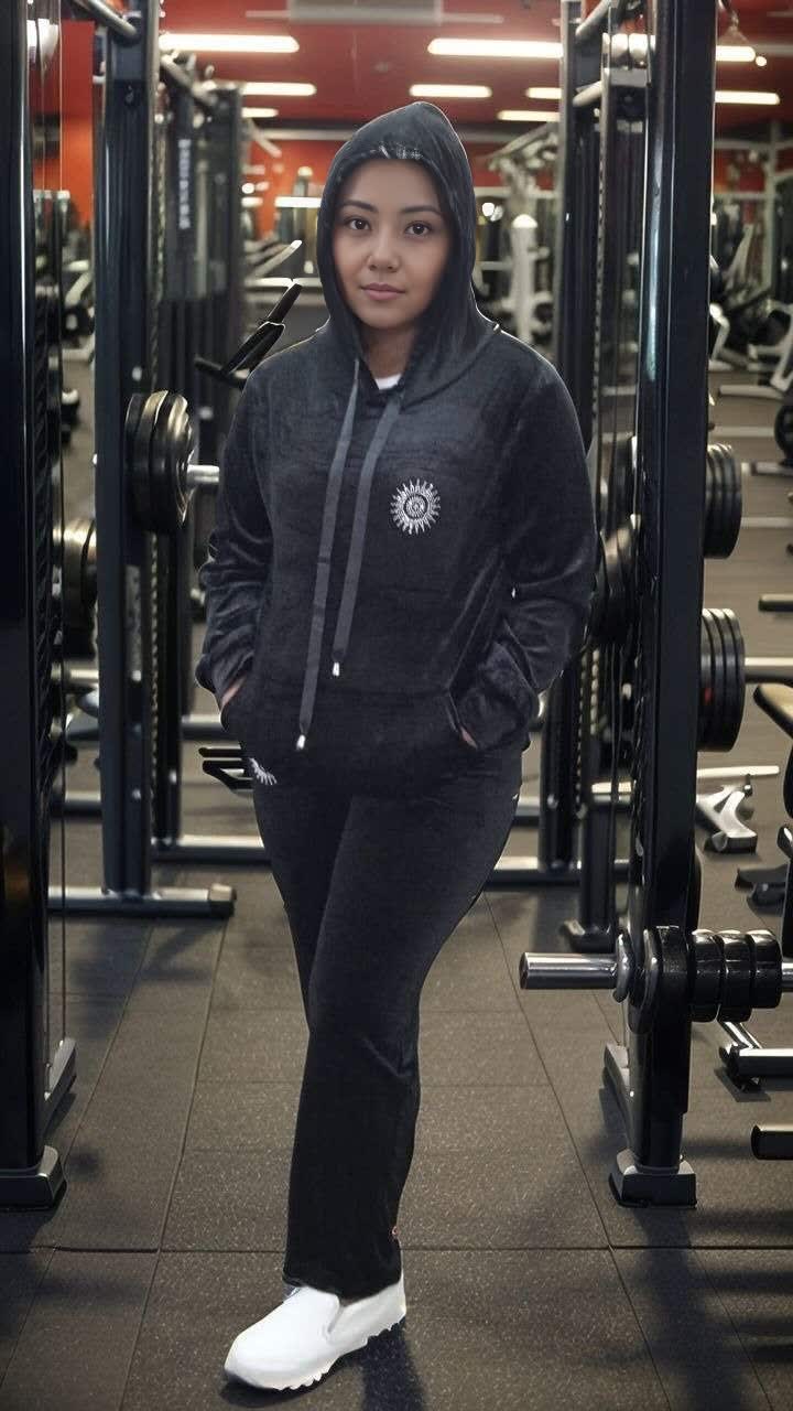 Dark zip-up hoodie and jogger pants set with drawstring hood and side pockets