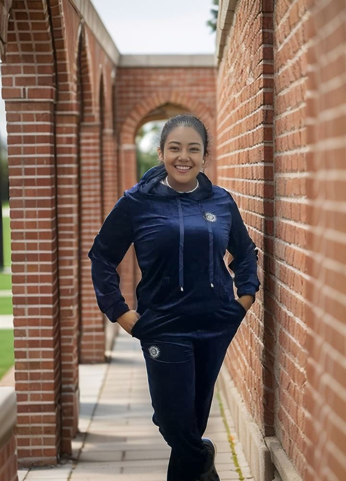 Navy zip-up hoodie and jogger pants set with drawstring hood and logo patch