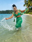 Green high-waist tiered maxi skirt with fluttering ruffle layers