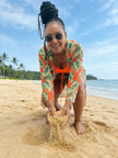 Orange high-waist swimsuit bottoms with tropical leaf-print open-front cover-up