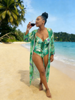 Green tropical print swimsuit with matching kimono cover-up, side view