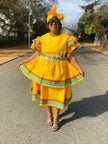 Yellow skirt dress set with rainbow-trim puff sleeves and tiered skirt