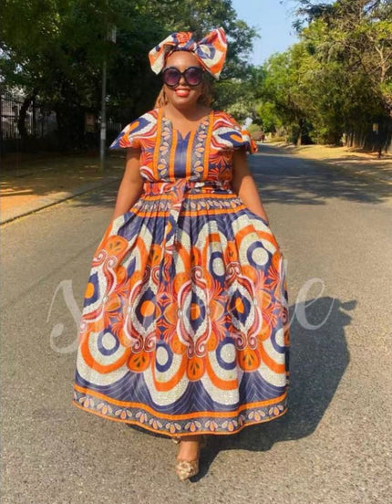 African print maxi dress with matching headwrap, short sleeves, multicolor pattern