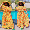 Ruffle off-shoulder maxi dress with tie waist, colorful leaf-print pattern