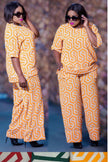 Geometric twin set with orange geometric print top and wide-leg pants