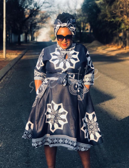 African print dress with matching headwrap, black with white geometric motifs
