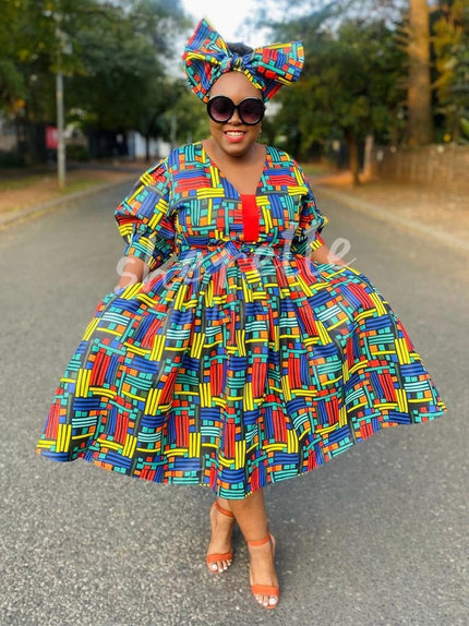 Geometric puff sleeve dress in colorful multicolor pattern, flared skirt