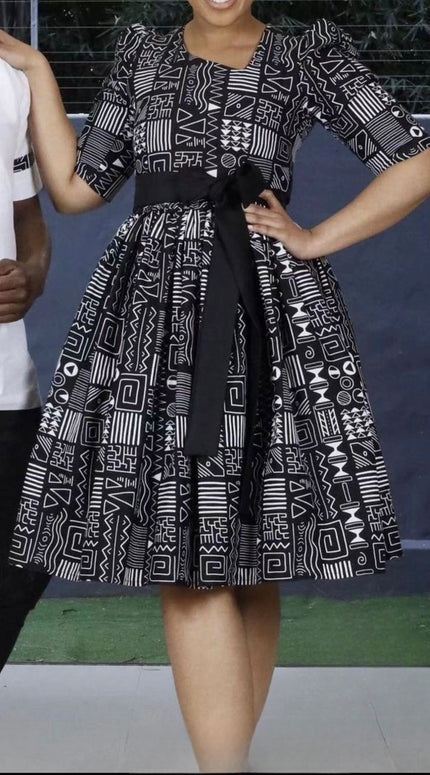 Geometric Print Flared Midi Dress with Belt Detail