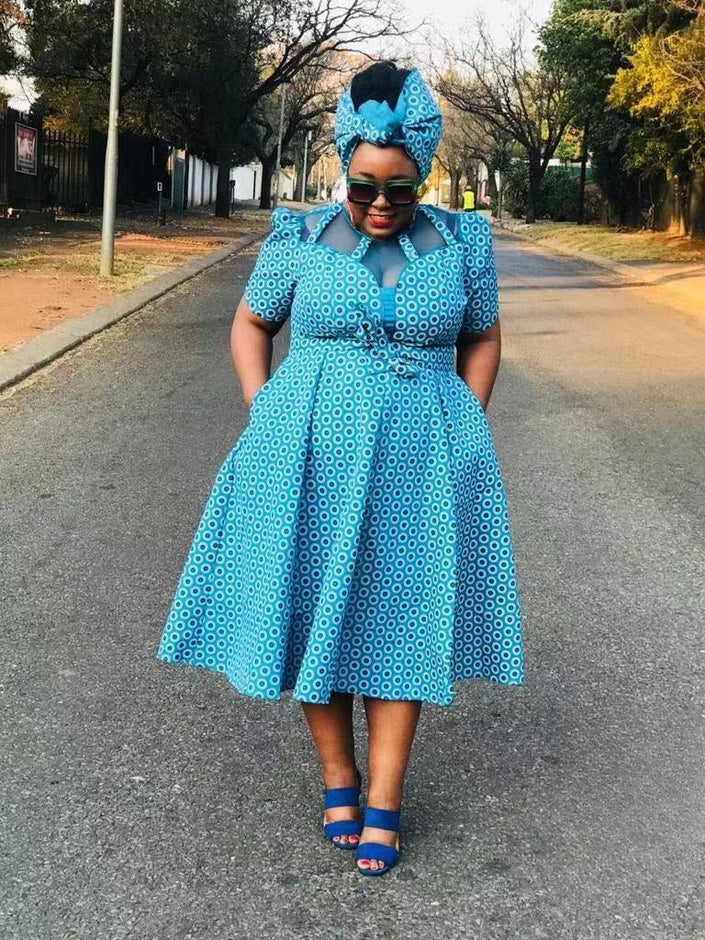 Blue patterned midi dress set with matching headwrap, short sleeves