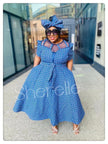 Turquoise patterned midi dress with matching headwrap, keyhole neckline