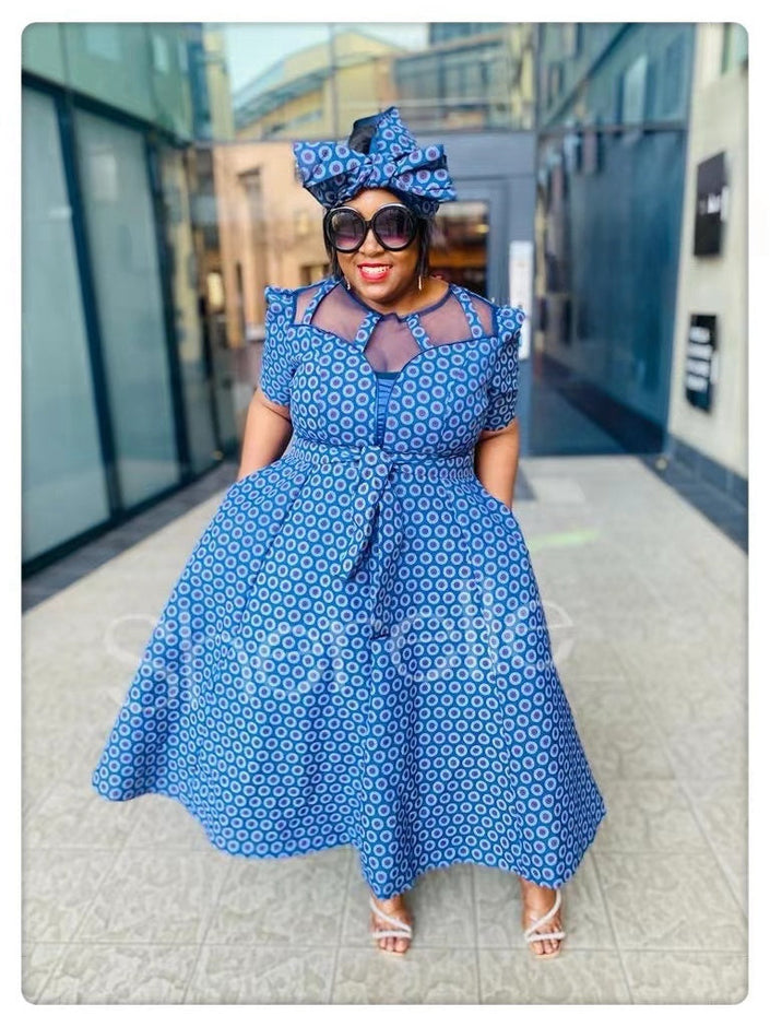 Turquoise patterned midi dress with matching headwrap, keyhole neckline