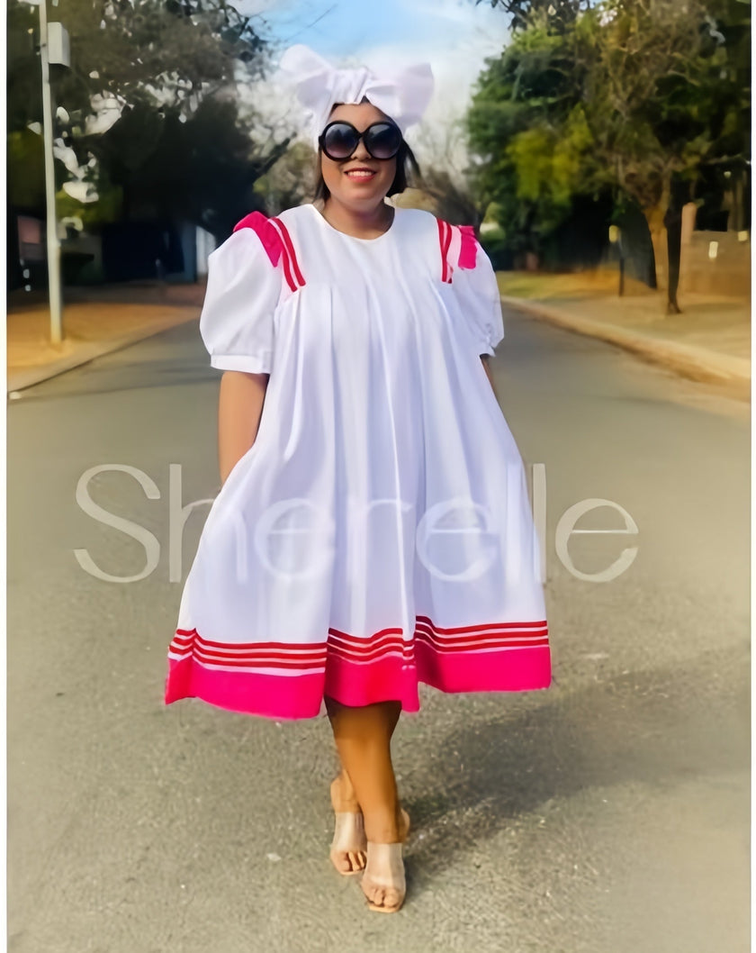 White puff-sleeve midi dress with pink striped cuffs and hem band