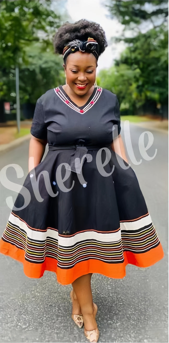 Belted midi dress with V-neck, black fabric, striped hem with orange border