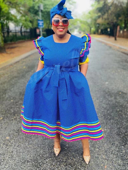 Blue ruffle-sleeve midi dress with multicolor striped hem