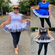 V-neck flared hem top with striped ruffle hem, shown in blue and black