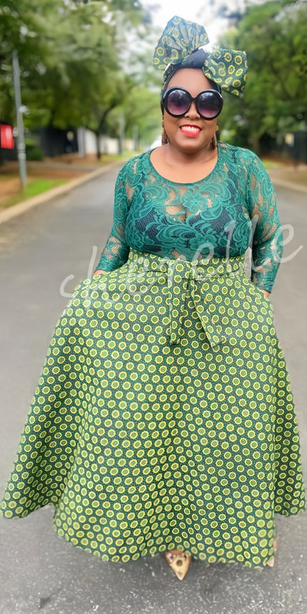 Geometric lace midi dress with 3/4 sleeves, green bodice and circle-pattern skirt