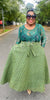 Traditional Geometric-Patterned Dress with Lace Bodice and Three-Quarter Sleeves