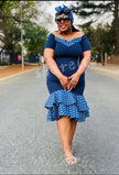 Blue ruffle layered midi dress with patterned bodice and tiered skirt, off-shoulder neckline
