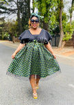V-Neck Flared Dress with Geometric Patterned Skirt and Bow Waist Detail