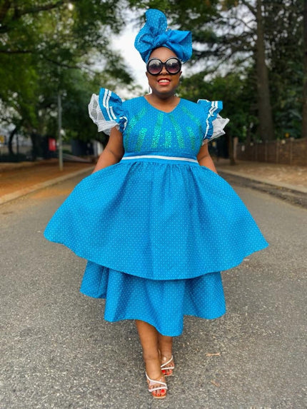 Blue puff-sleeve layered A-line dress with tiered skirt