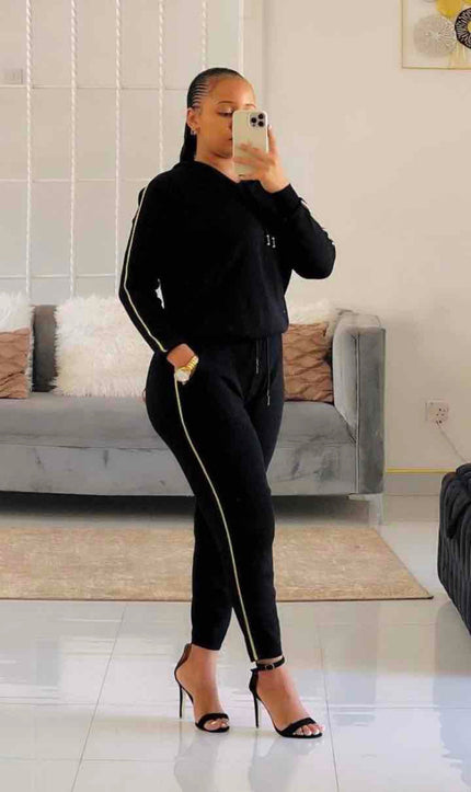 FashionPrice twin set hoodie and pants, black with side stripe detail and drawstring waist