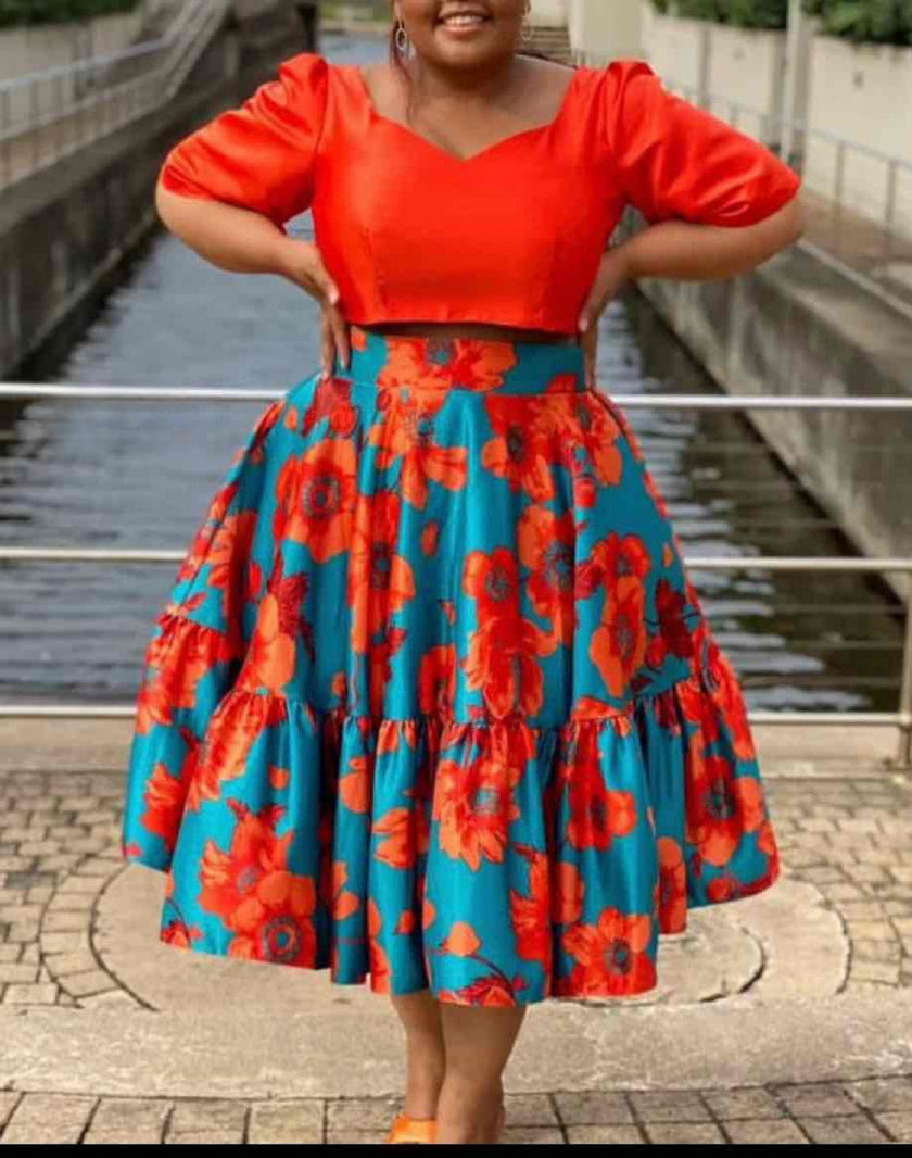 Floral twin set dress with puff sleeve orange top and blue ruffle skirt
