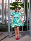 Tropical leaf mini dress with puff sleeves and belted waist, teal and white print