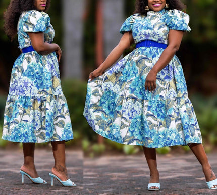 Blue floral midi dress with puff sleeves and cinched stretch waist