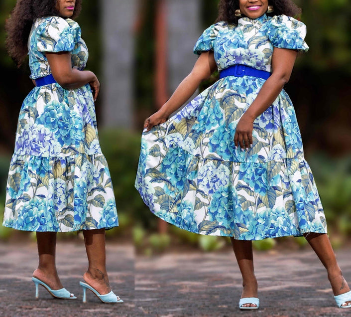 Blue floral midi dress with puff sleeves and cinched stretch waist