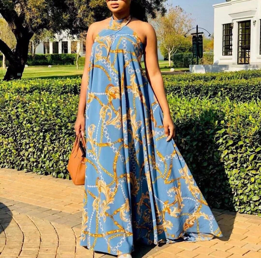 Blue printed maxi halter dress with loose fit, sleeveless styling and ornate chain pattern