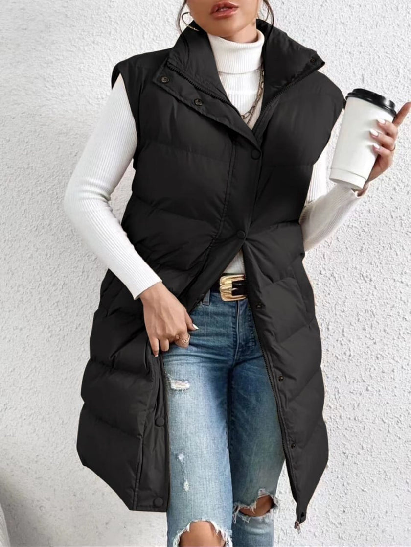 Black sleeveless puffer vest with high collar, button front and side pockets
