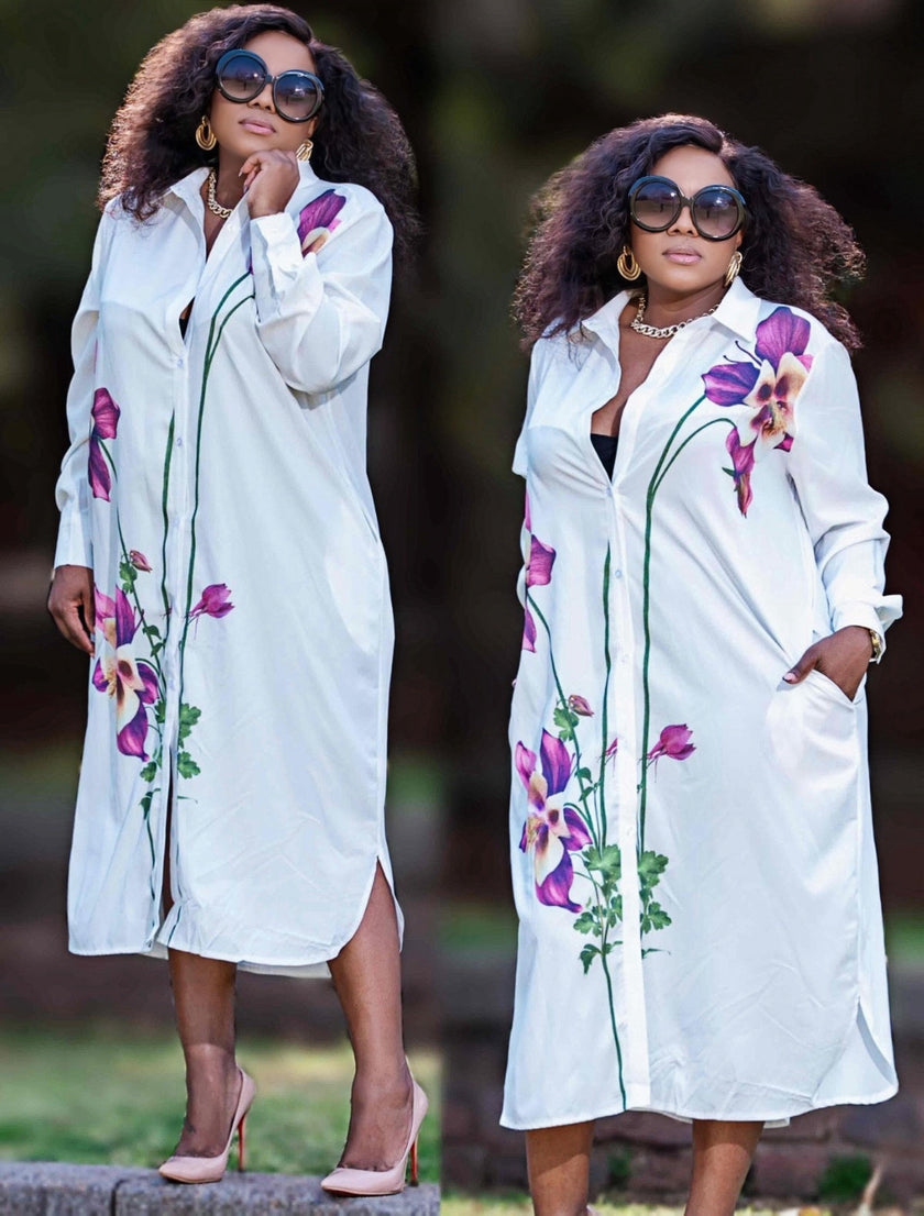 White long-sleeve shirt dress with purple and green floral print, front buttons