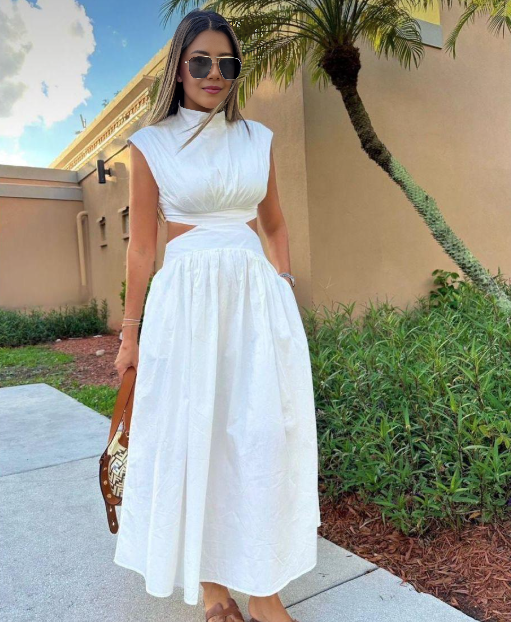 White sleeveless high-neck A-line midi dress with waist cut-out, gathered skirt