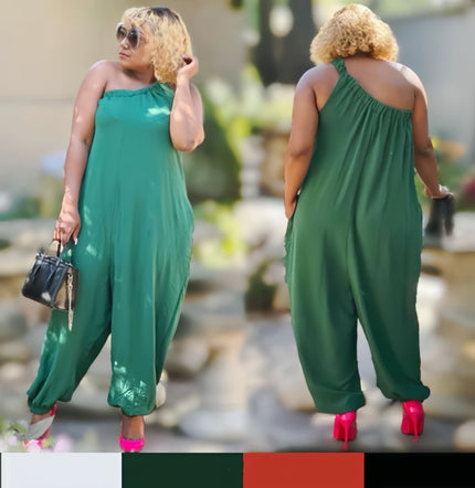 One-shoulder green loose-fit jumpsuit with wide legs and backless-style neckline