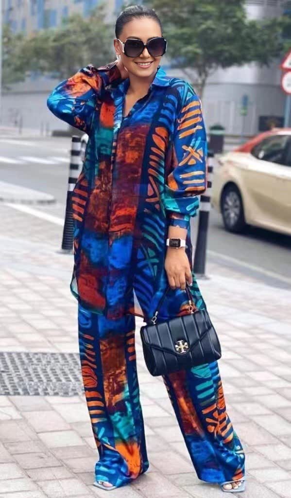 Abstract printed twin set: blue/orange long-sleeve top with matching wide-leg pants