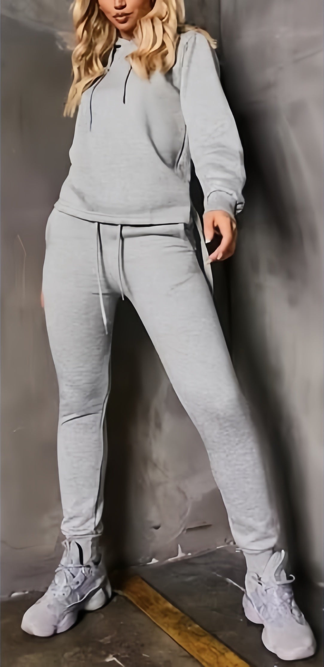 Gray hoodie and jogger set with adjustable hood and drawstring waist