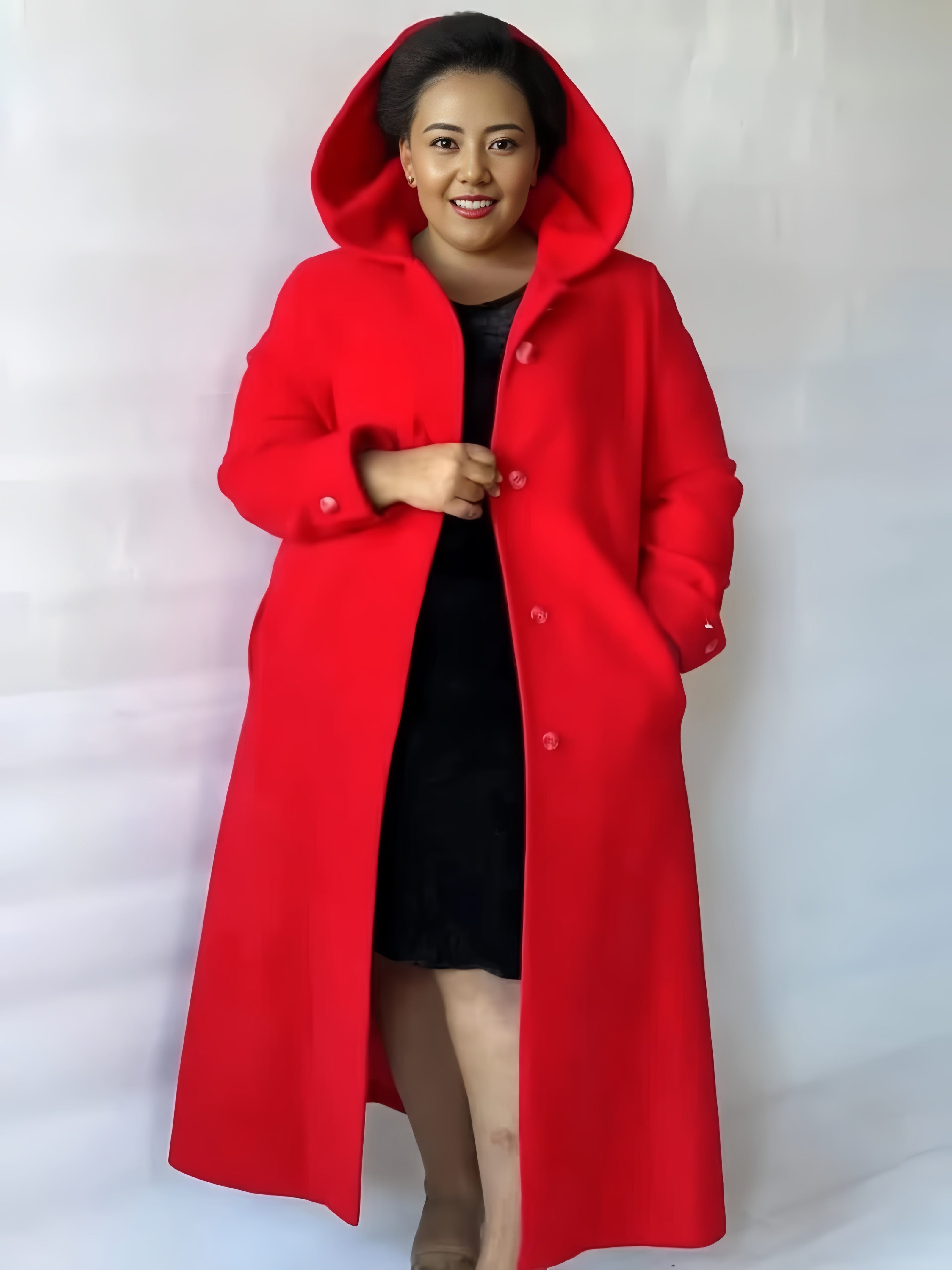 Knee-length hooded coat in red with button front, long sleeves, and side pockets