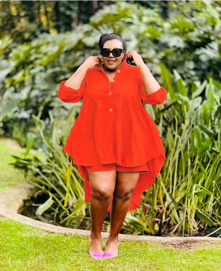 Red high-low tunic with button front and matching shorts, asymmetrical swing hem
