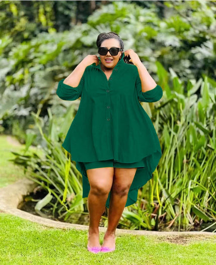 Green high-low tunic with buttons and matching shorts, draped asymmetric hem