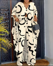Abstract print V-neck top and pant set, cream with black curve shapes