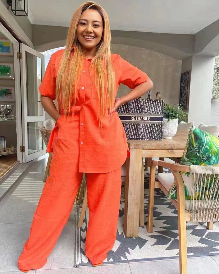 Orange-red two-piece set: collared short-sleeve button top and wide-leg pants