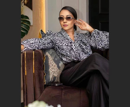 Printed button-up top and matching trousers, black-and-white geometric pattern