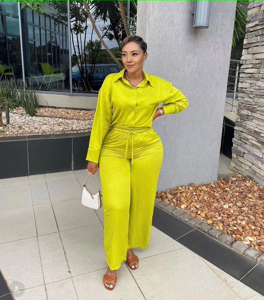 Lime green two-piece shirt and pant set with button front and drawstring waist