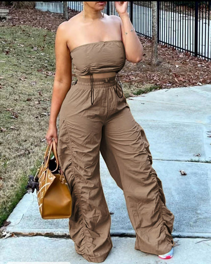 Taupe strapless jumpsuit with ruched bodice, drawstring waist, wide-leg pants