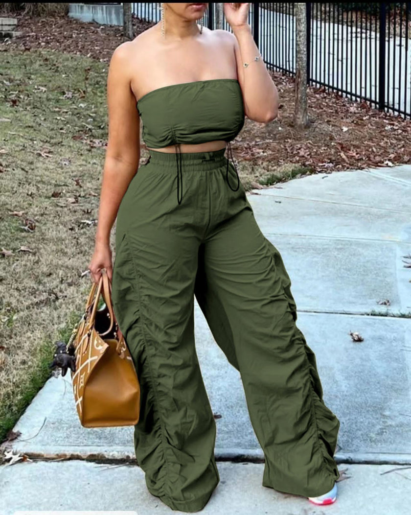 Dark olive strapless jumpsuit with ruched bodice, drawstring waist, wide-leg pants